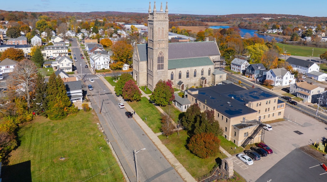 Saint Mary of the Assumption Church aerial view in fall at 17 Winter Street in historic town center of Milford, Massachusetts MA, USA.
