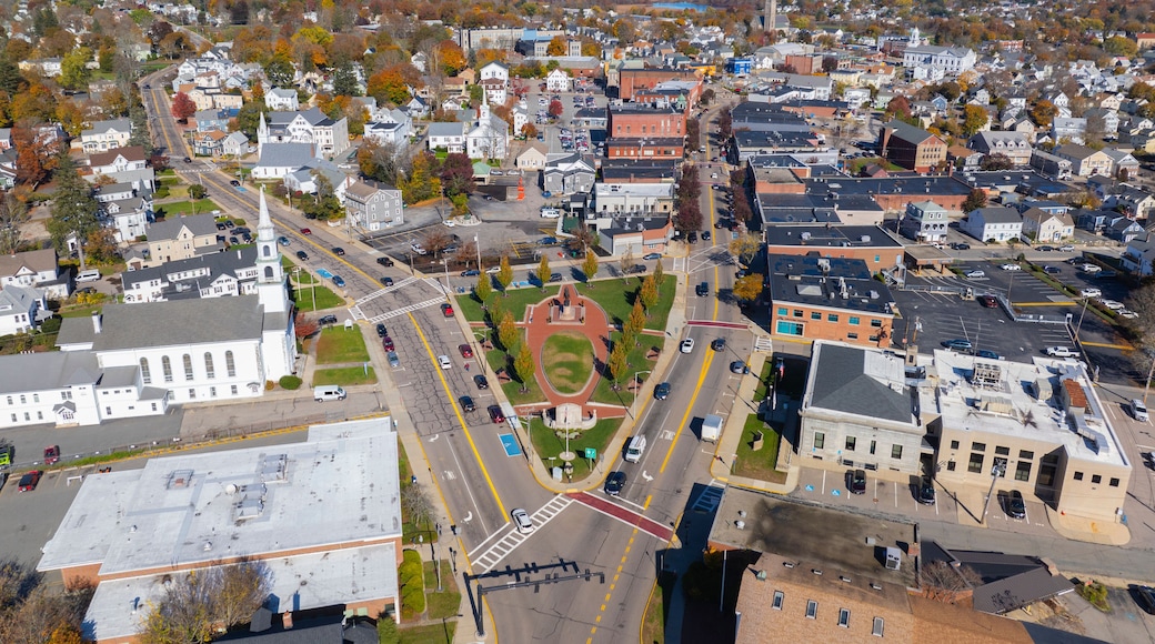 First Congregational Church aerial view in fall at Draper Memorial Park at 4 Congress Street in historic town center of Milford, Massachusetts MA, USA.