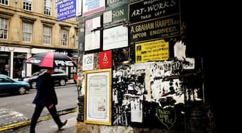 This lane through the tenements leads into a courtyard with many places to visit.
Finnieston has lots of fantastic bars and eateries, yet still has an off licence where they push your purchases through a small hole in the barsa along the counter.