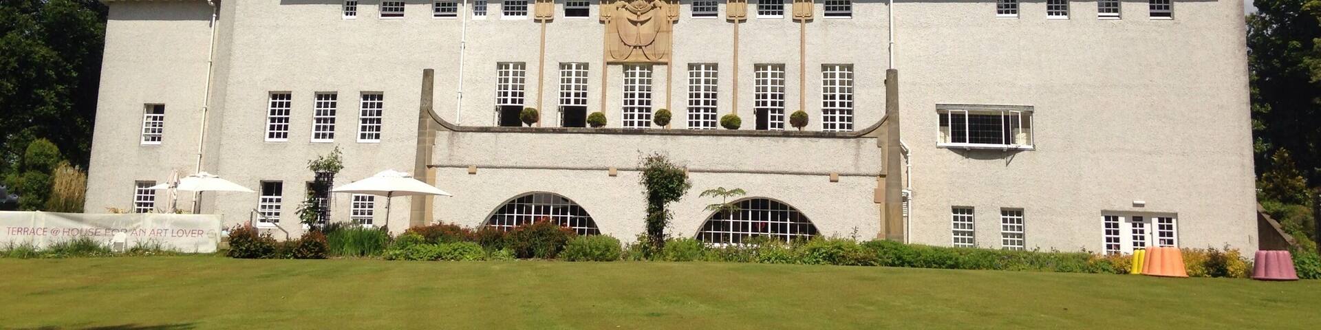 Charles Rennie Macintosh's "House For an Art Lover". A beautiful house where you can also have a lovely meal and then visit the walled garden afterwards.