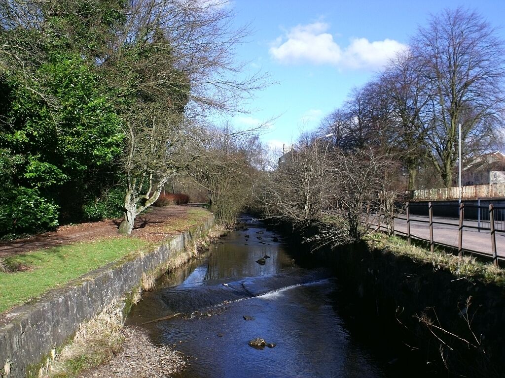 The Garrel Burn, Kilsyth Flowing between high built up banks near Backbrae Street.