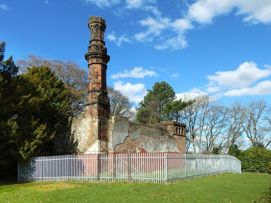 Rosshall Gardens: the old boiler house. This building was Rosshill, a house. In its role as the main house of the estate, it was superseded by Ross Hall (built in 1877). At some later time, the original building, Rosshill, was made a boiler house; the incongruous castellated chimney is a reminder of that use.