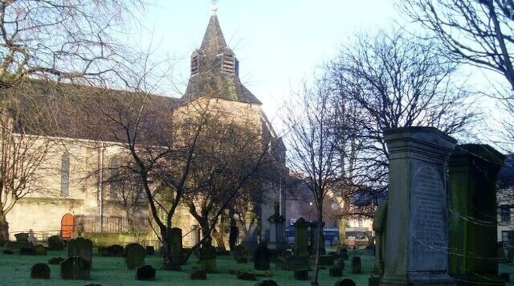 Gravestones in cemetery by Main Street, Rutherglen Behind a church that looks onto the town's King Street.