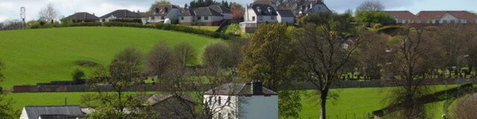 Burnhouse Farm and Mearns cemetery Background houses on Whitehill Grove and Old Humbie Road.