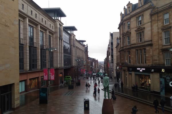 A view from The Glasgow Royal Concert Hall's steps.
Donald Dewar Statue is seen on the center-right. Buchanan Street is the main shopping street of Scotland's biggest city Glasgow.
#OrbitzTravel #scotland #glasgow