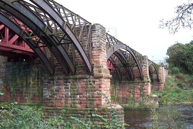 Railway Bridge at Uddingston the down stream half carries the present railway and the upstream half, shown here, is disused.
