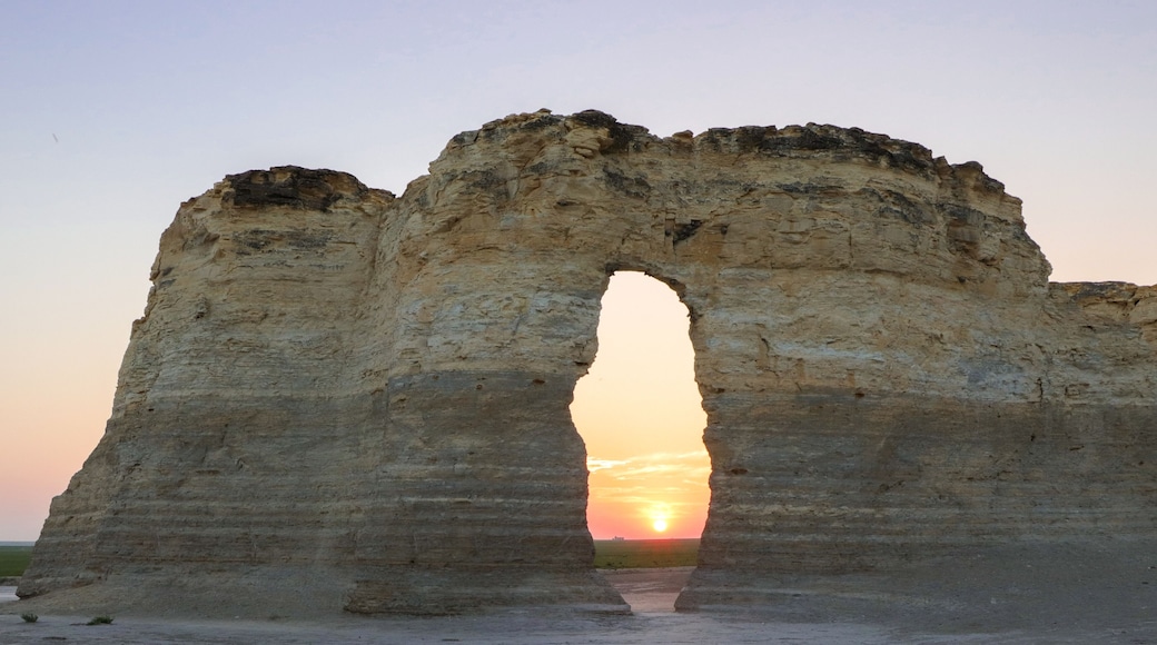 Monument Rocks Keyhole at sunset. Chalk pyramid geologic formation in western Kansas seen as sun sets on the Kansas High Plains.