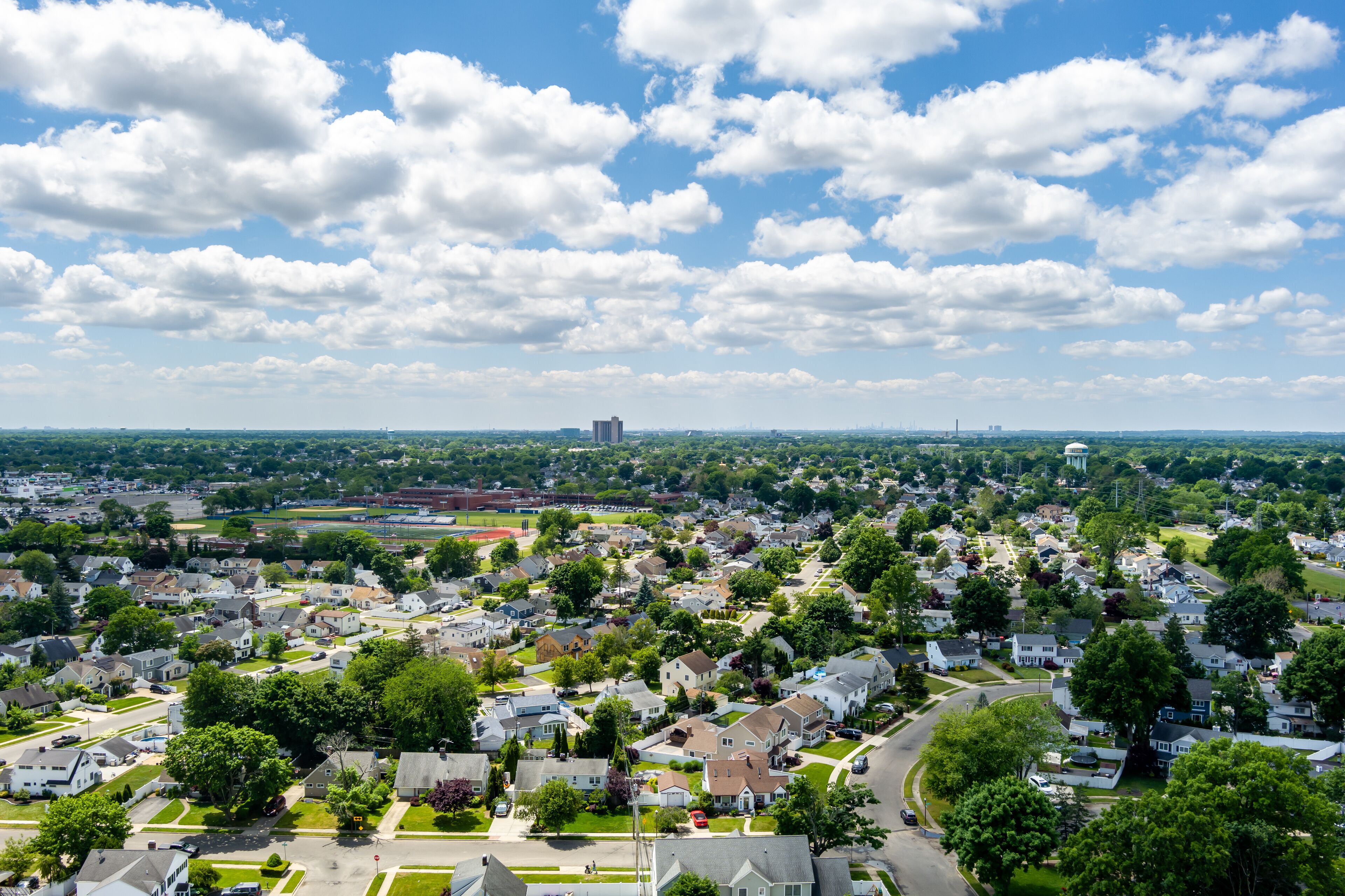 Aerial view of Nassau County Long Island on a partly cloudy day.
