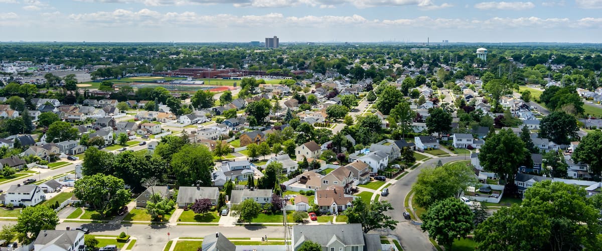 Aerial view of Nassau County Long Island on a partly cloudy day.