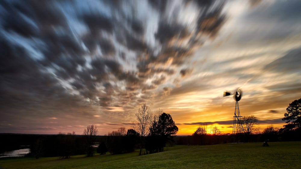 Sunset Windmill with clouds in motion