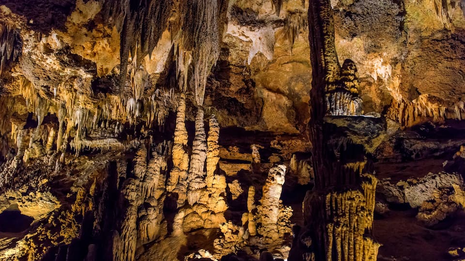 A cave with stalactites and stalagmites.