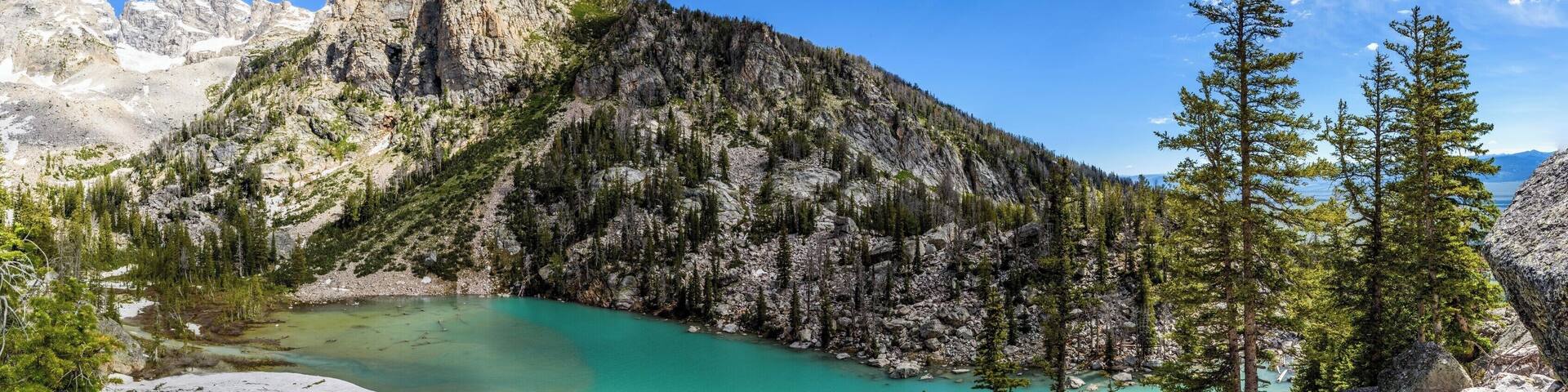 There is no official trail to this beautiful lake in the Grand Tetons. When you hike up to Surprise and Amphitheater Lake, you have to leave the trail after about 5km and follow the cairns or better have a GPS device with you.
The last part is very steep but the reward you will get at the end is priceless.