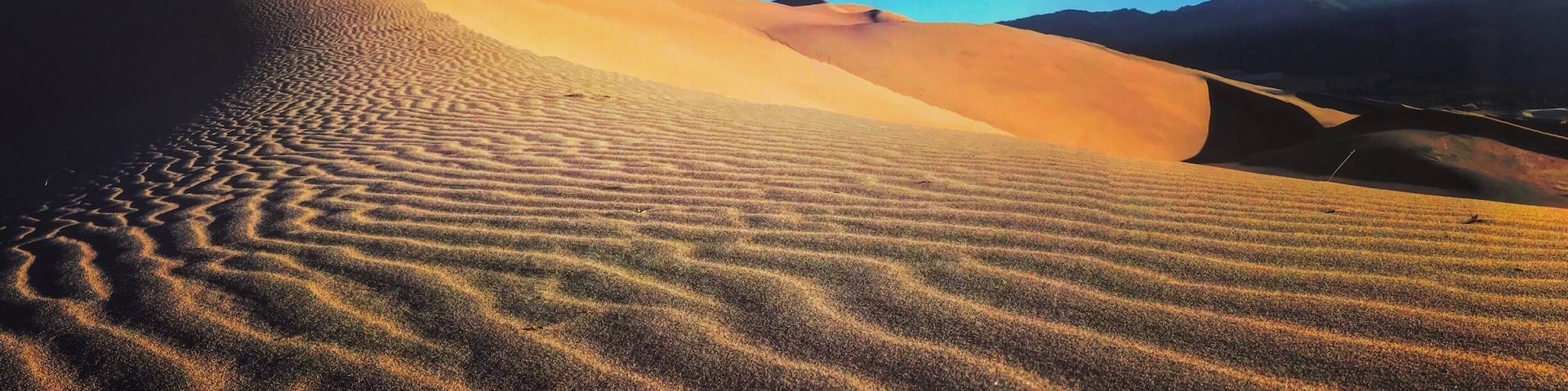 The Great Sand Dunes national park located in the middle of the San Luis Valley. The best time to visit us Springs and fall as the summer temps are too high for exploring. A desert nestled between 14,000’peaks. In spring the contrast between white capped snowy peaks and the desert sands is a fantastic contrast.