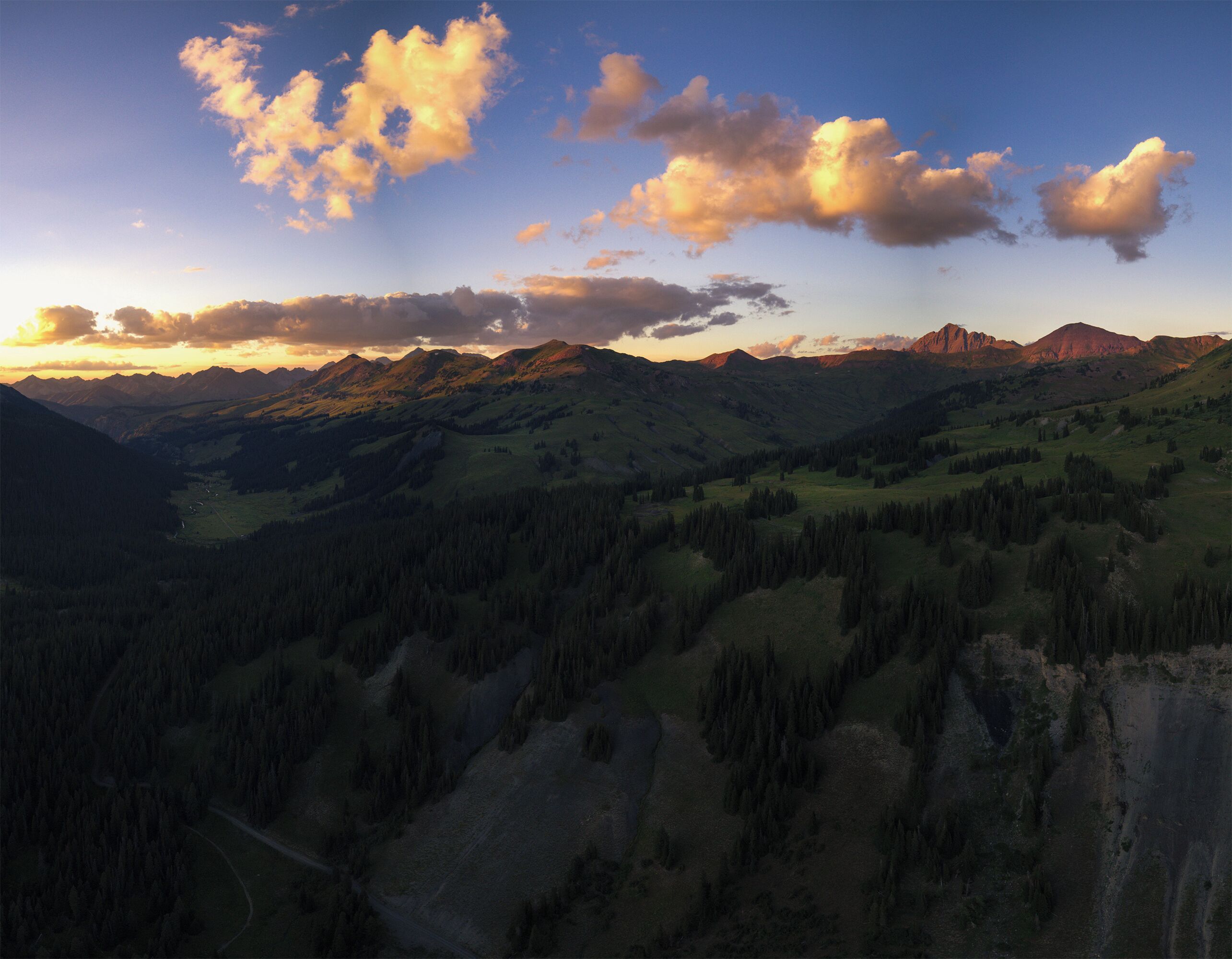Moving down the trail the clouds move fast, but the light faster. 