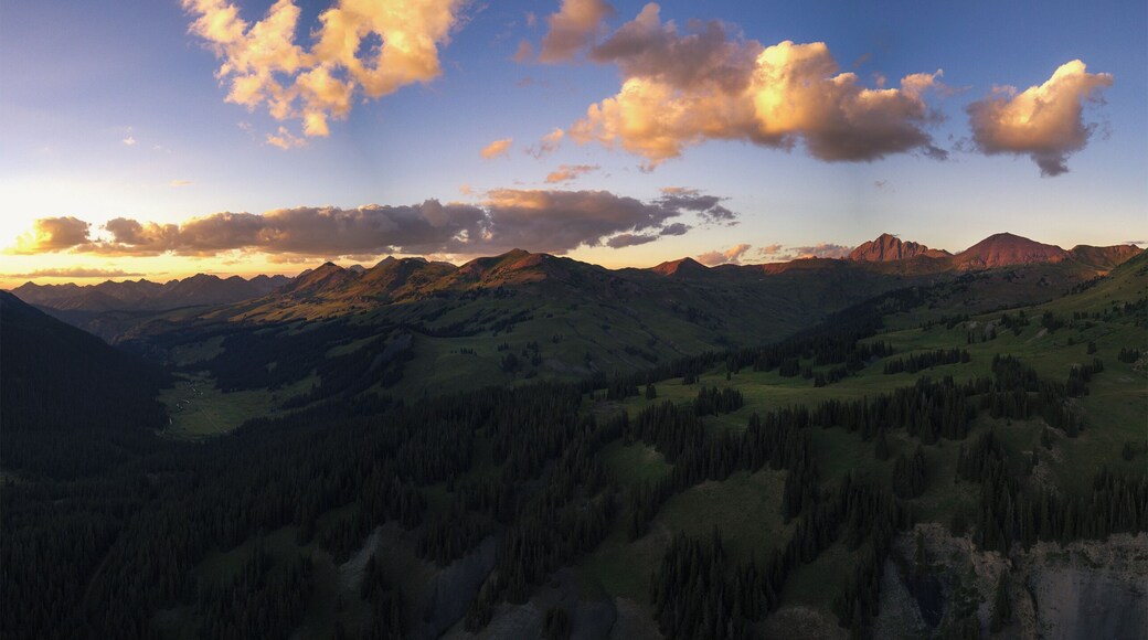 Moving down the trail the clouds move fast, but the light faster.