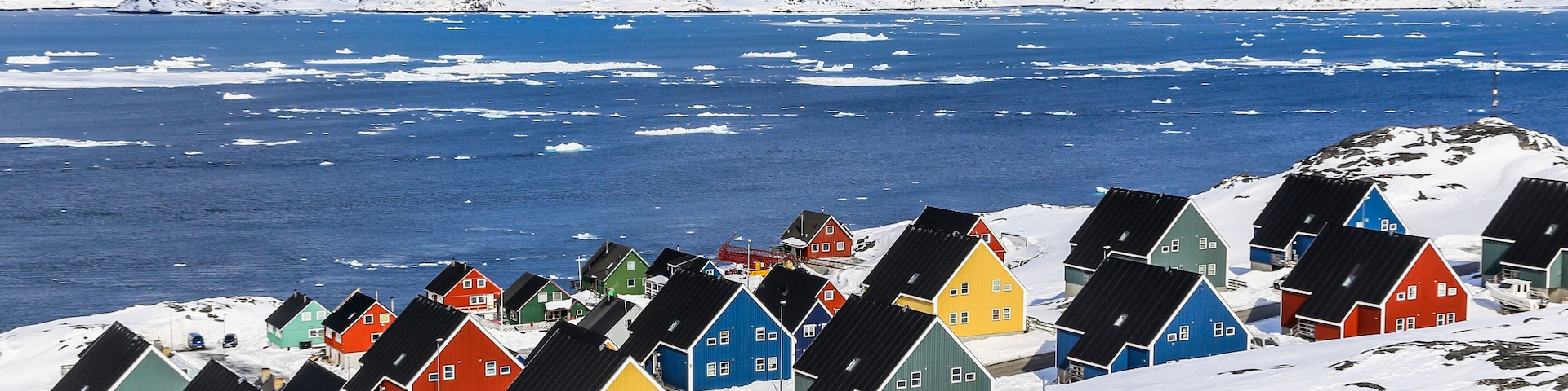 Colorful inuit houses in a suburb of arctic capital Nuuk