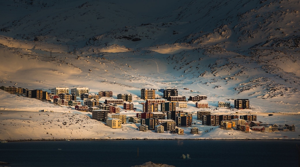 Nuuk which includes a city and snow