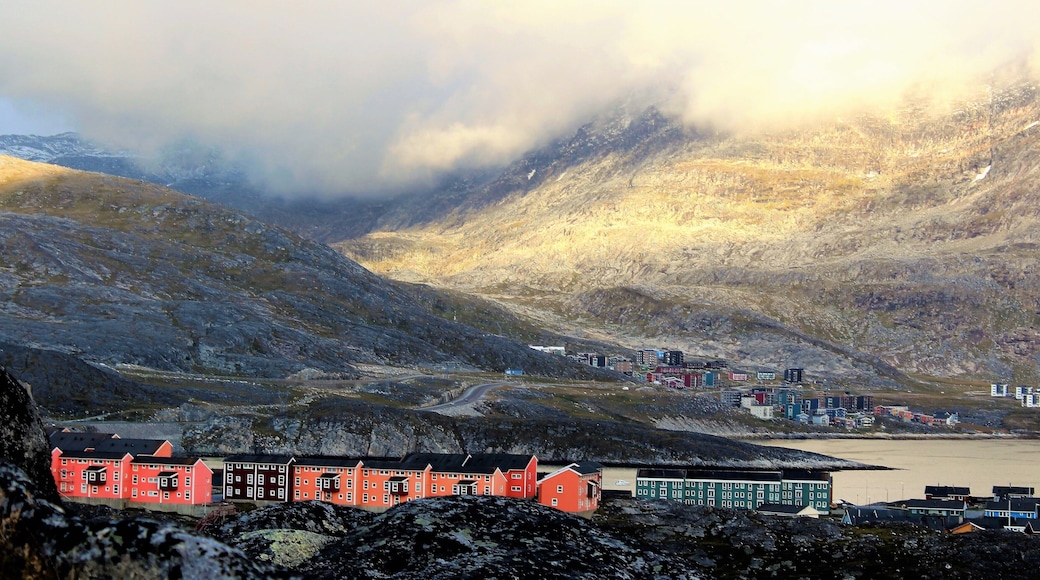I took this in Nuuk, Greenland in August 2018.. More specifically at the Nuuk Port and Harbour, the largest port in Greenland.
Nuuk is the capital city of Greenland and I really enjoyed my few days there. Its easy to walk around and there's beautiful views on all sides :). I took this photo from a hill near my guest house. I had a nice walk up there and got some pretty awesome views. The mountains were breathtaking and the waters pristine and gorgeous!
Nuuk Port and Harbour is located in Old Nuuk, the picturesque old part of town. The harbour entrance is restricted due to the tide during much of the year and ice during winter. The inner port area is home to a marina for smaller vessels and ferry and larger vessels to the east side of the port area. And Nuup Kangerlua is a 160 km (99.4 mi) long fjord. It is the longest fjord on the Labrador Sea coast of Greenland, and one of the longest in the inhabited part of the country. I also took a wonderful boat ride on it, as well. As shown in a couple of my other photos :).