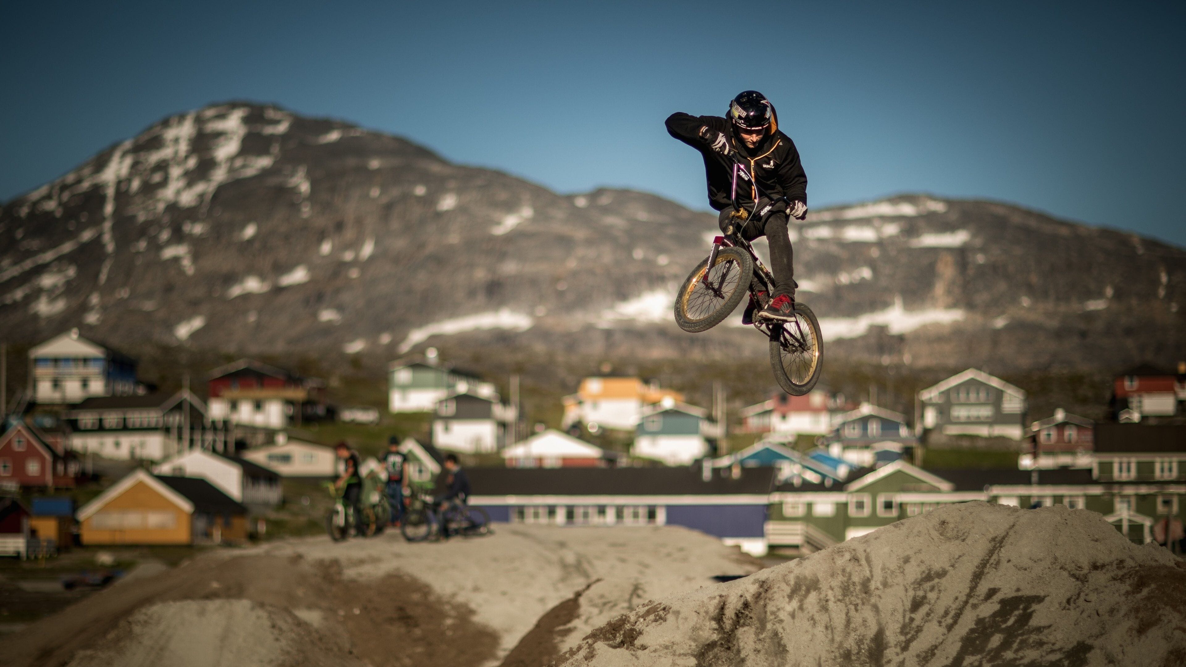Nuuk showing mountains, mountain biking and a city