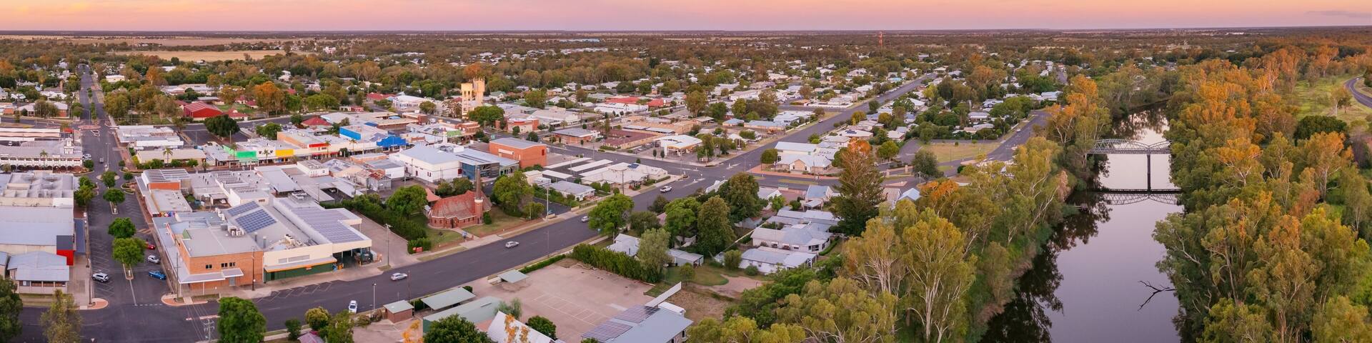 Aerial panorama of a regional town in golden evening light