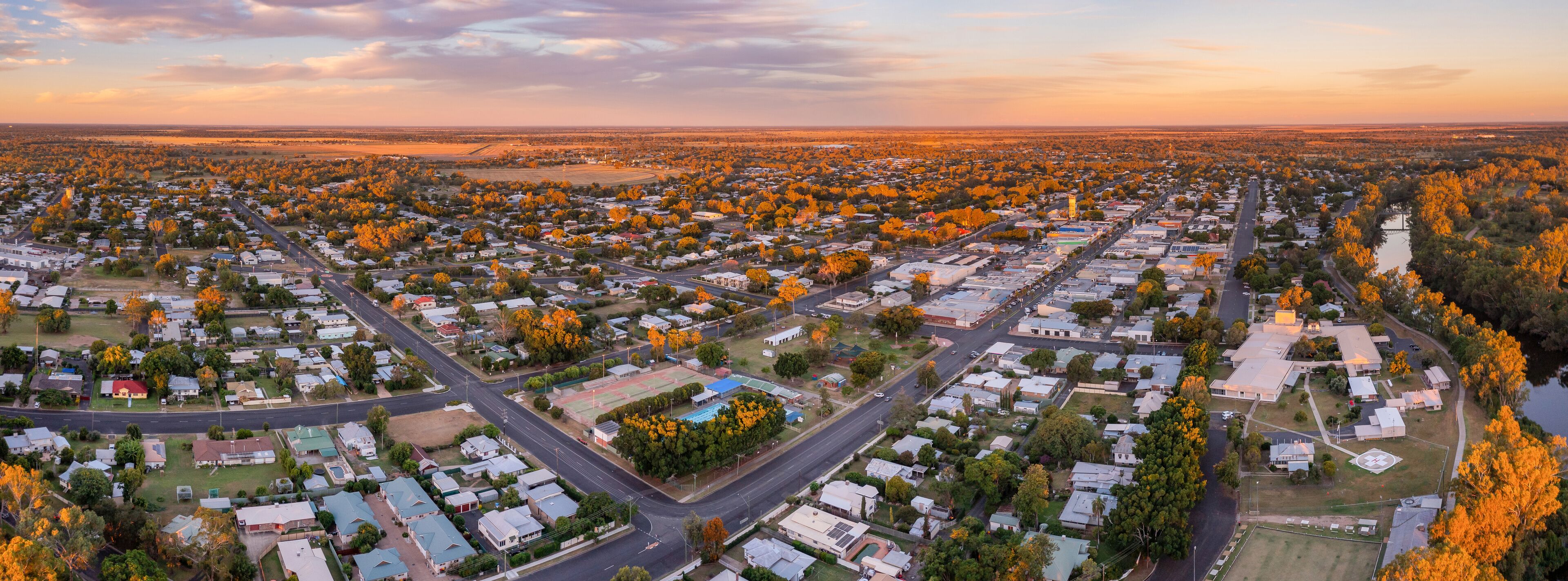 Aerial panorama of a regional town in golden evening light