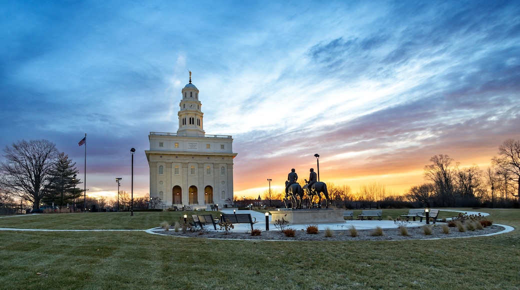 Nauvoo IL Temple at sunrise with bright red and yellow sky
