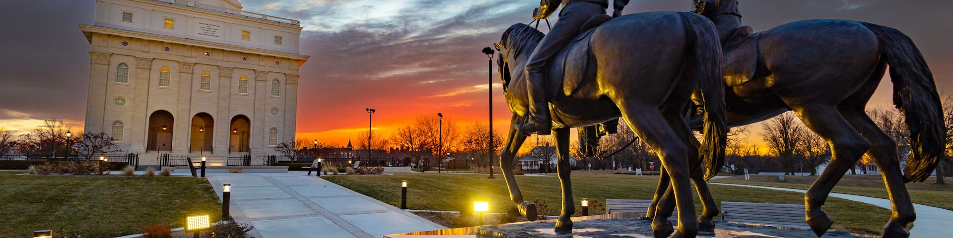 Nauvoo IL Temple at sunrise with bright red and yellow sky