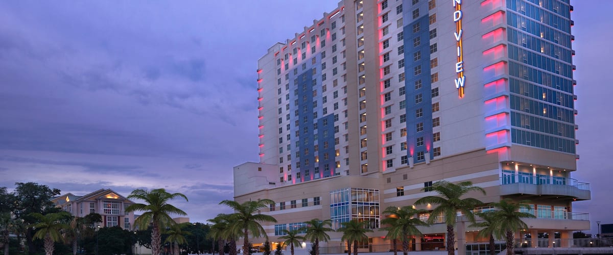 Gulfport featuring a beach, general coastal views and night scenes