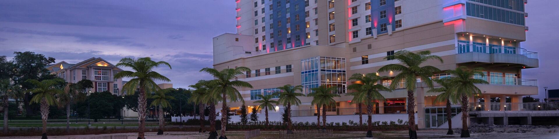 Gulfport featuring a beach, general coastal views and night scenes