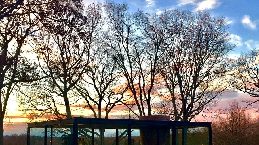 Glasshouse by Phillip Johnson, we went there in November and we were able to see it when the Sun is setting. Stunning!!