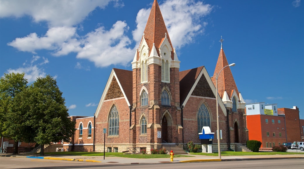 Grand Island showing a church or cathedral, heritage architecture and a small town or village