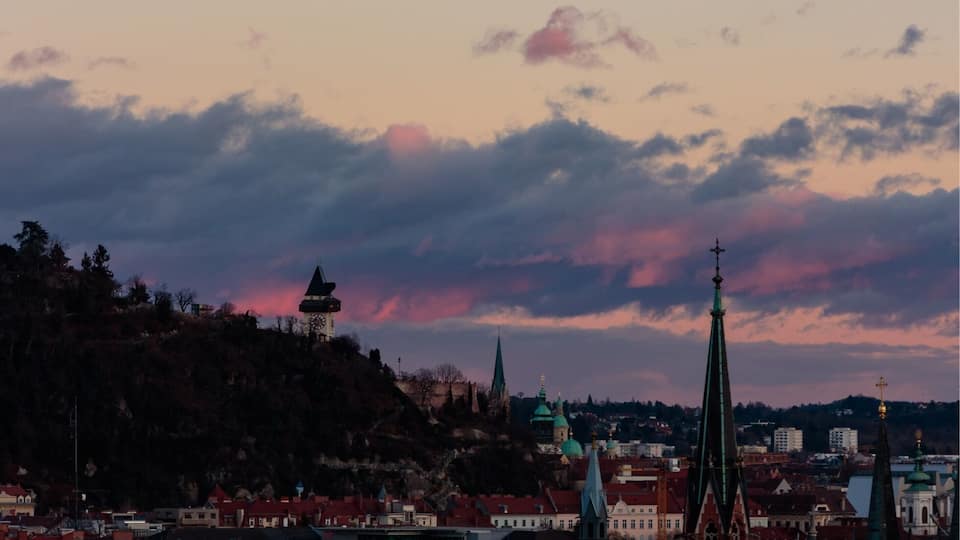 The Uhrturm/Clock tower of Graz at sunset 🌄