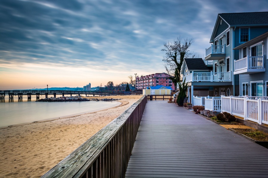 House on the boardwalk and the shore of the Chesapeake Bay, in North Beach, Maryland
