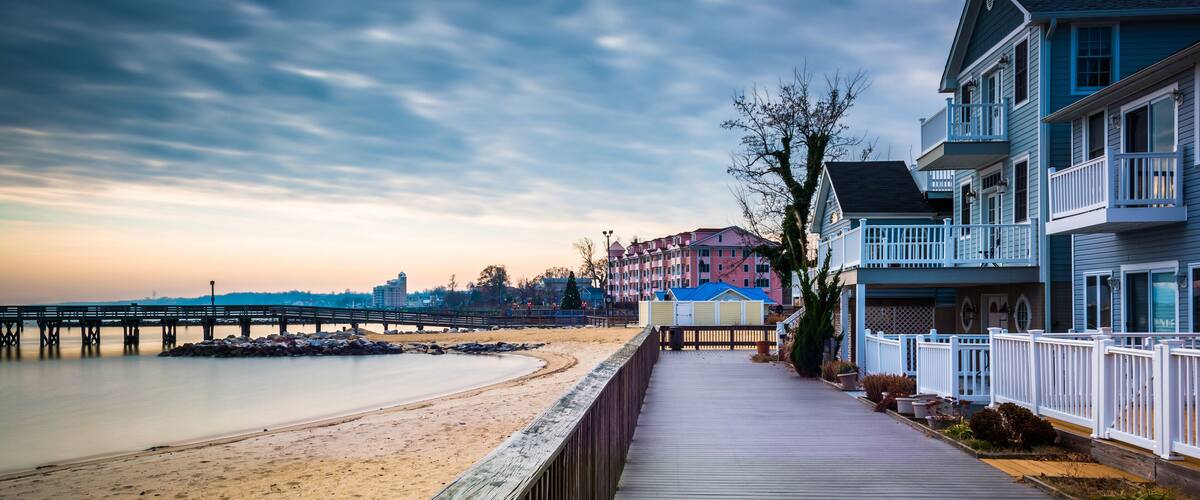House on the boardwalk and the shore of the Chesapeake Bay, in North Beach, Maryland