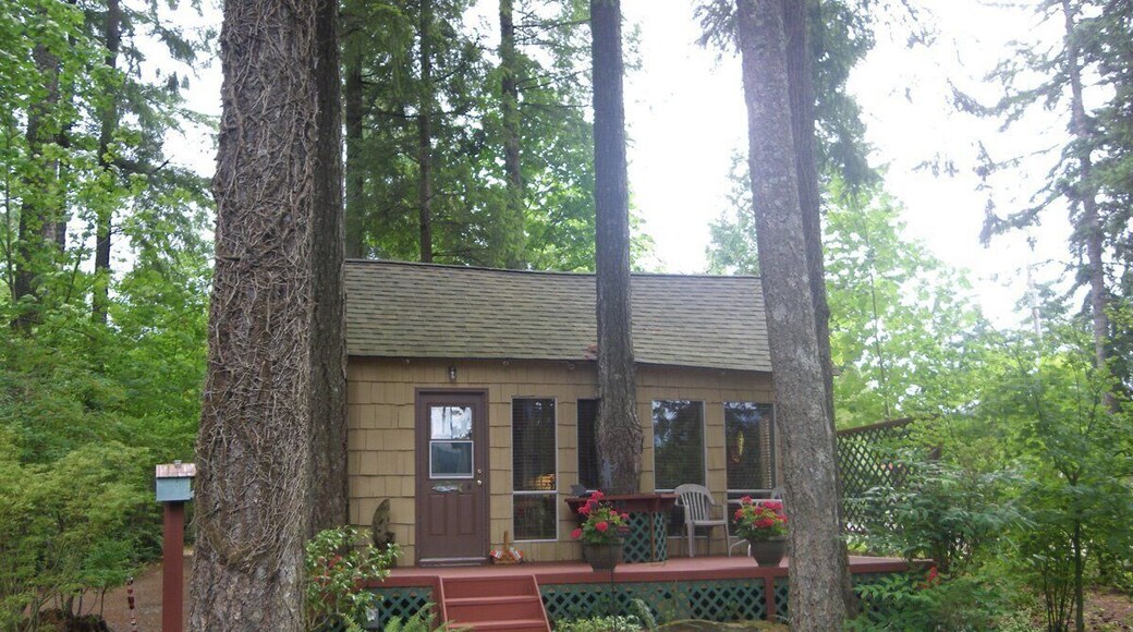 "Herb's Place" is a turn-of-the-century fisherman's cabin delighting guests at the Roaring River Bed 'n Breakfast, overlooking the Wenatchee River from a bluff in North Bend, Washington.