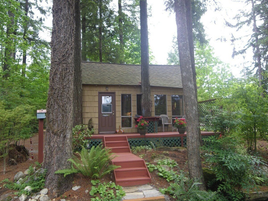 "Herb's Place" is a turn-of-the-century fisherman's cabin delighting guests at the Roaring River Bed 'n Breakfast, overlooking the Wenatchee River from a bluff in North Bend, Washington.