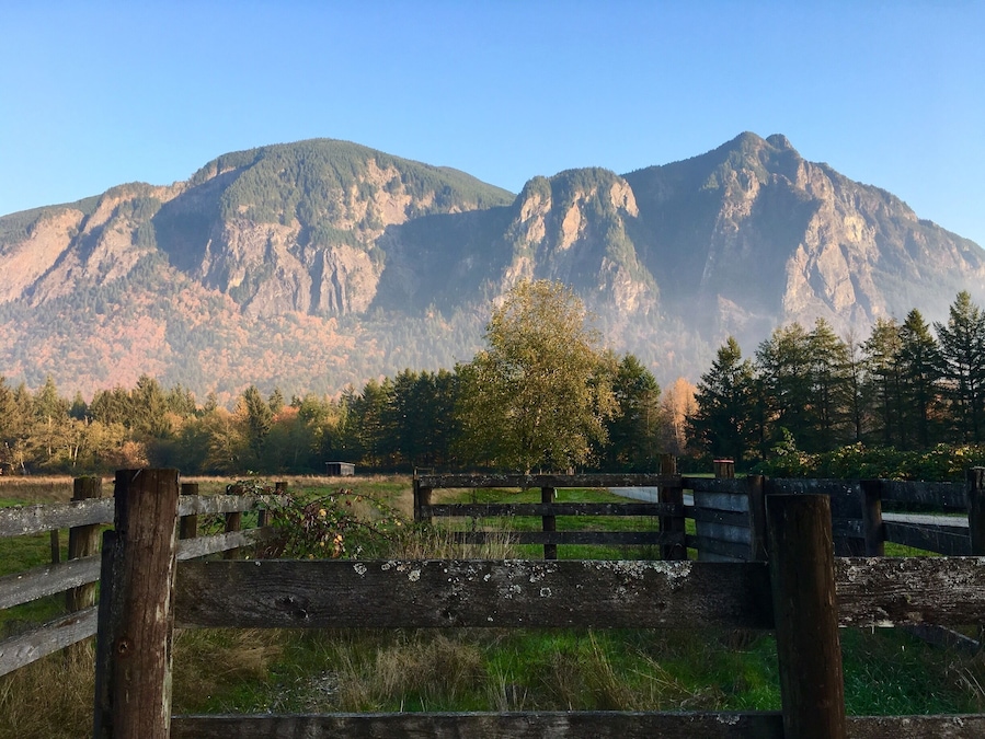 View of a slightly foggy Mount Si from a ranch near Rockwood Farm