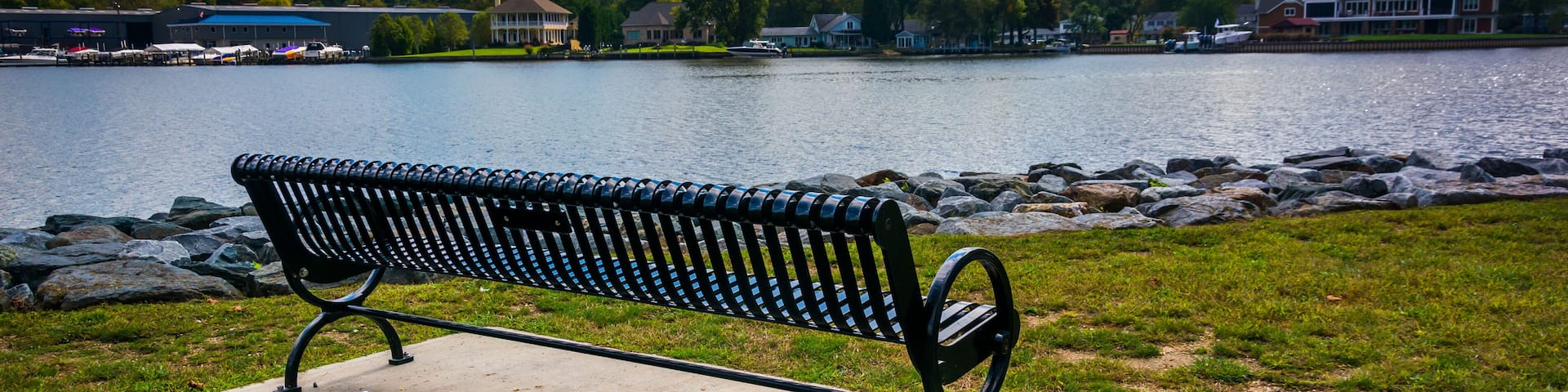 Bench along the shore of the North East River in North East, Mar