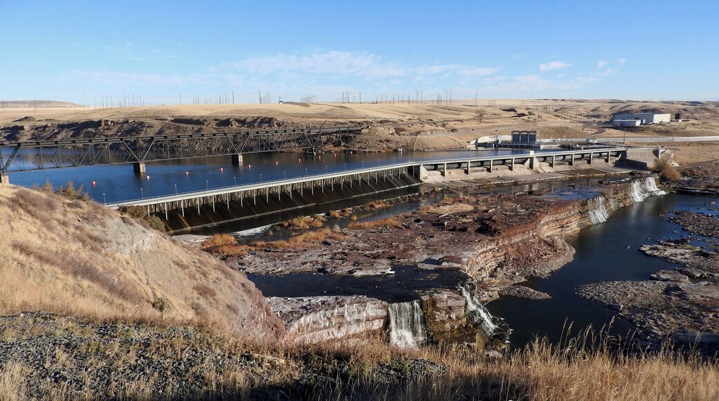 Rainbow Dam is a hydroelectric dam on the Missouri River, 29 feet (8.8 m) high and 1,055 feet (322 m) long, located six miles northeast of Great Falls in the U.S. state of Montana. The dam is named for the downstream Rainbow Falls, a 45 ft (14 m) waterfall that is the third of the five Great Falls of the Missouri. Built in 1910, the dam furnishes water to an eight-unit hydroelectric plant with a capacity of 36 megawatts. As the dam's power plant is located over a half-mile downstream, the flow of water over Rainbow Falls and downstream Crooked Falls is significantly reduced during the dry season.