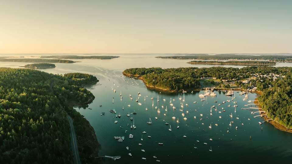 Panoramic drone shot of sunrise in Northeast Harbor, Main near Bar Harbor on Mount Desert Island
