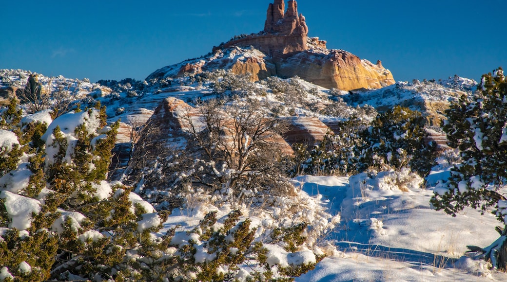 USA, New Mexico, Gallup, Red Rock Park. Church Rock in winter sunrise.