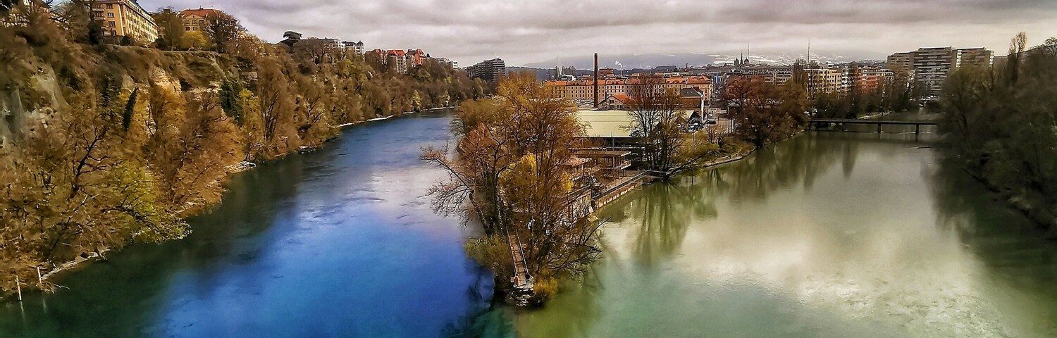 Pointe de la Jonction is the place where rivers The Arve and the Rhone meet up, each river having its own color, a feast to the eyes!
