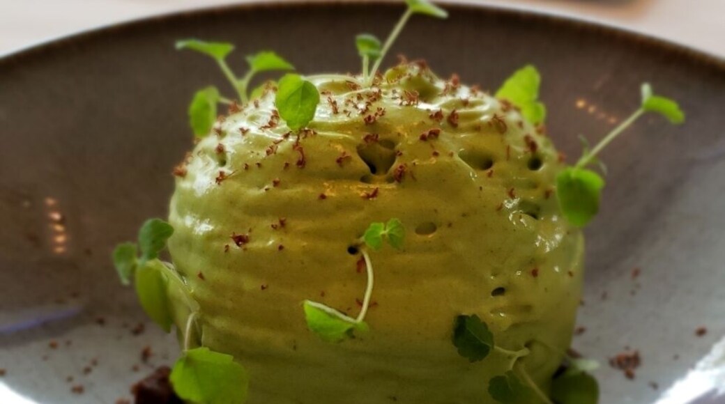 Dessert on the banks of Lake Geneva - Mint creme with a chocolate core with a mini donut in the background #LifeAtExpedia #sweet #GoodEats