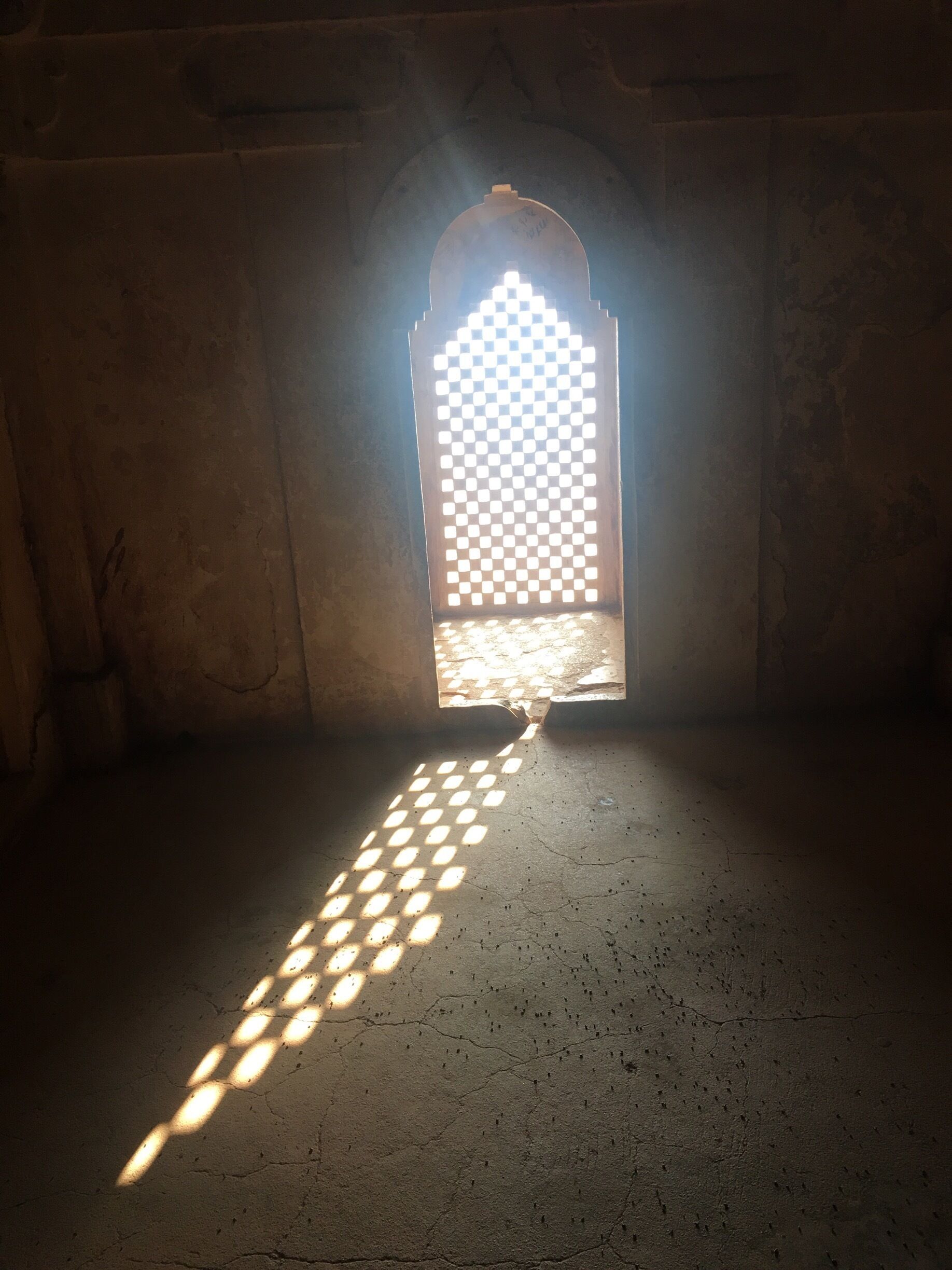 Window with light & dark effect due to sun rays