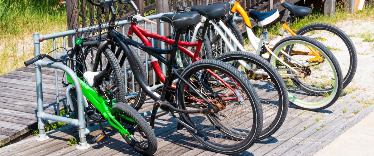 A wooden dock with bicycles parked on it.