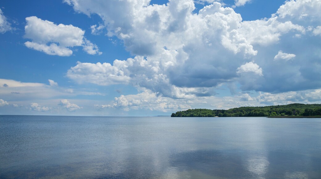 Mille Lacs Lake below dramatic clouds in north central Minnesota on a sunny summer afternoon