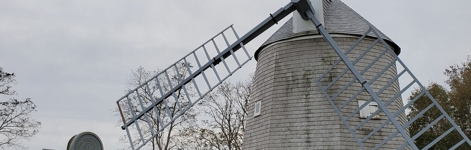 This windmill was built in the early 1700's in South Orleans. By 1839 it was moved to overlook the Town Cove on the present hillside site of The Governor Prence Motor Inn on Rt 6A. During the recent restoration it was relocated to the small park on the shore of Town Cove where it stands today.