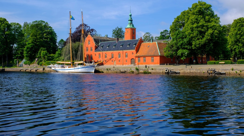 Sweden, Halland County, Halmstad, HSwMS Najaden moored in front of Halmstad Castle