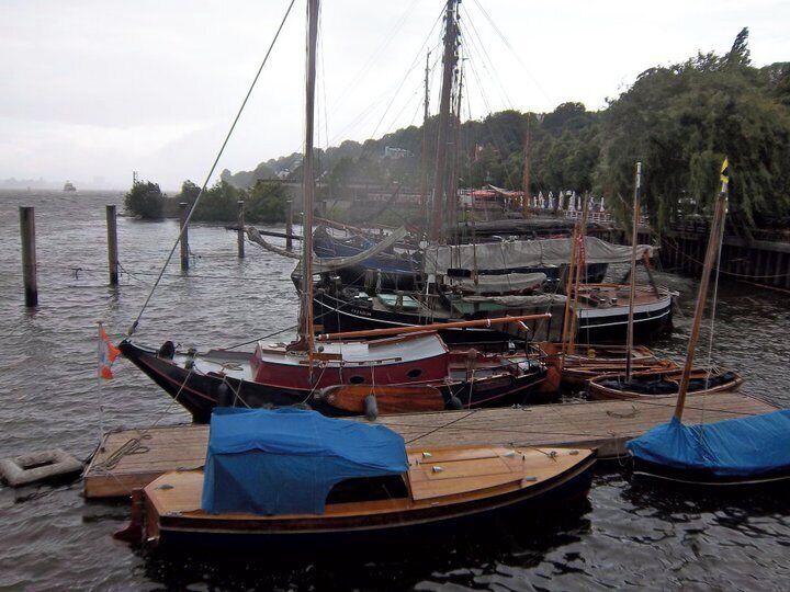 Boats nestled into Hamburg Hafen on a cloudy morning. 