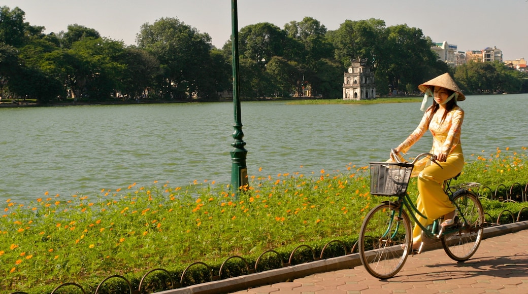Hanoi showing cycling as well as an individual femail